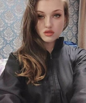 Оля